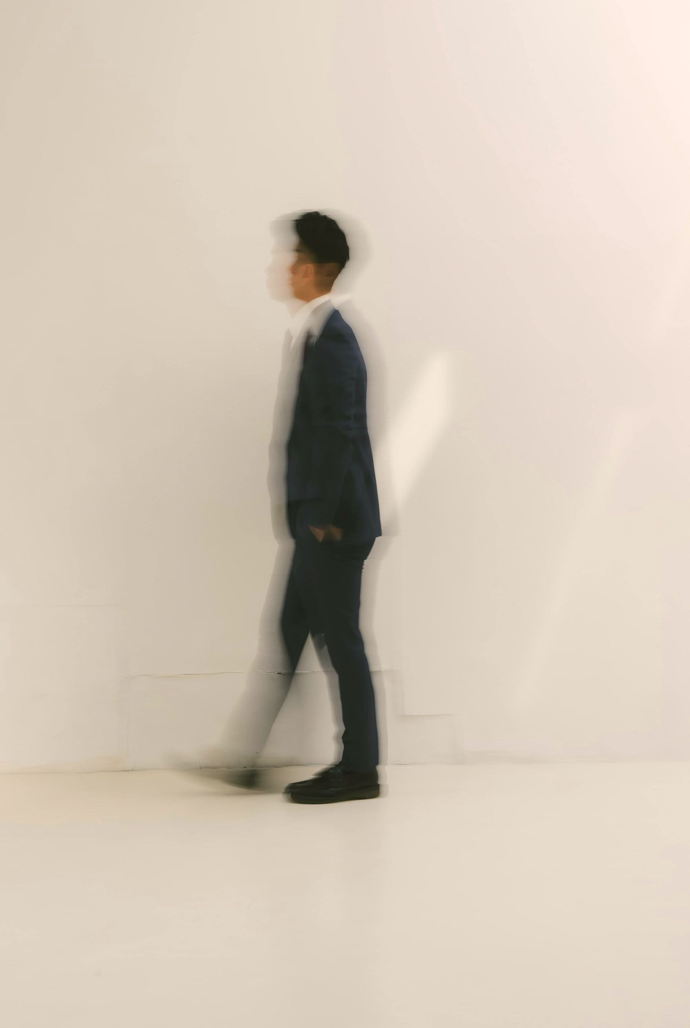 man walking in suite
